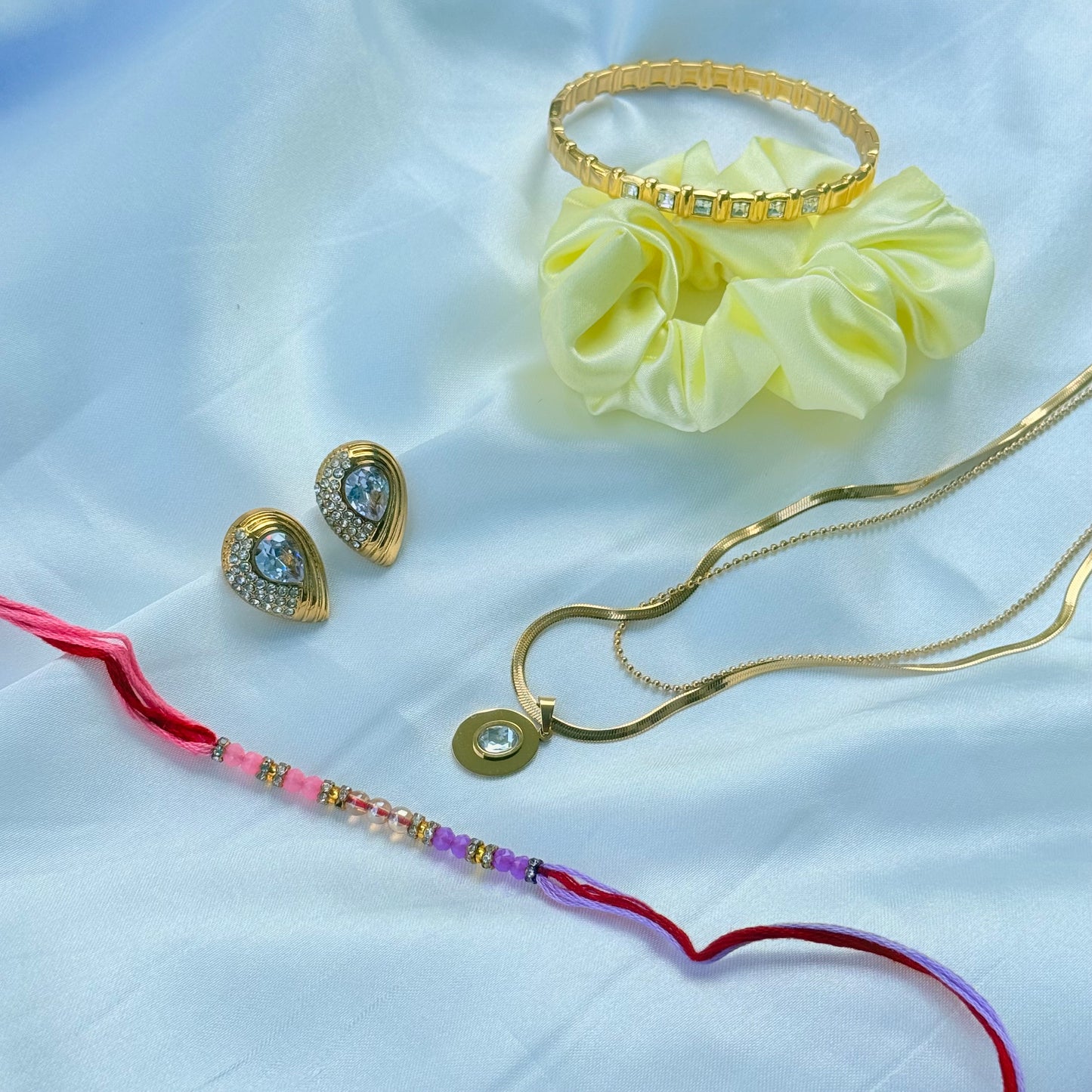 Rakhi Combo - Elegant Gold - White